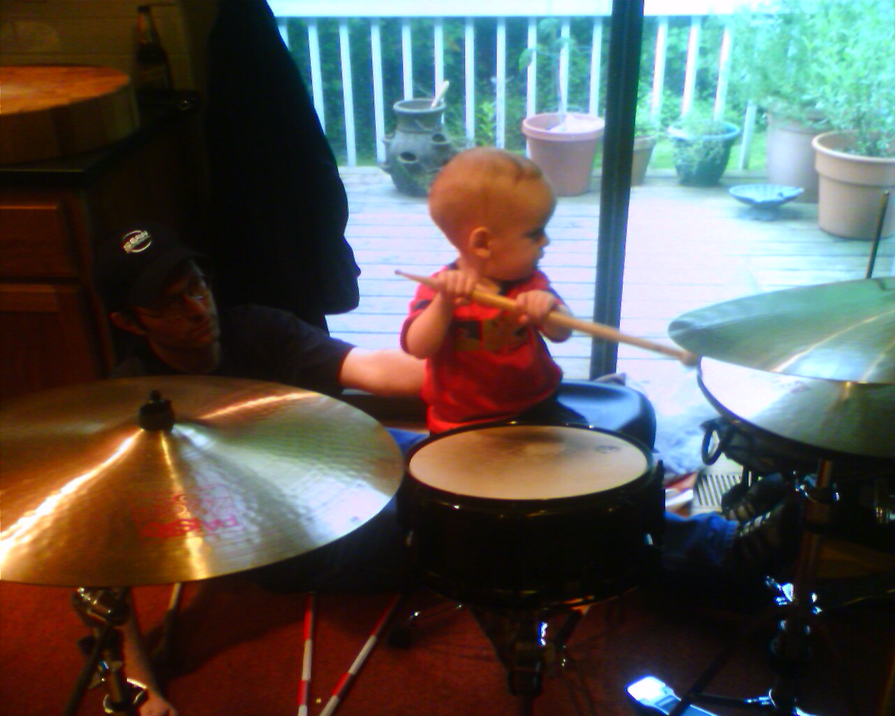 Avery plays the drums