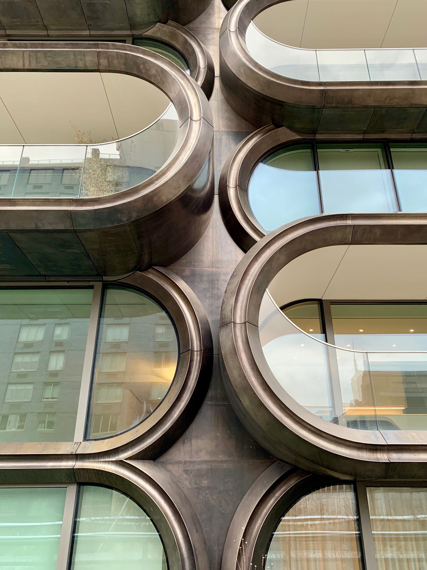 Detail of <a href="https://en.wikipedia.org/wiki/520_West_28th_Street">520 West 28th Street</a>, currently <a href="https://en.wikipedia.org/wiki/Zaha_Hadid">Zaha Hadid</a>'s only building in NYC. (Apparently there's a posthumous 5th Ave skyscraper under consideration.)